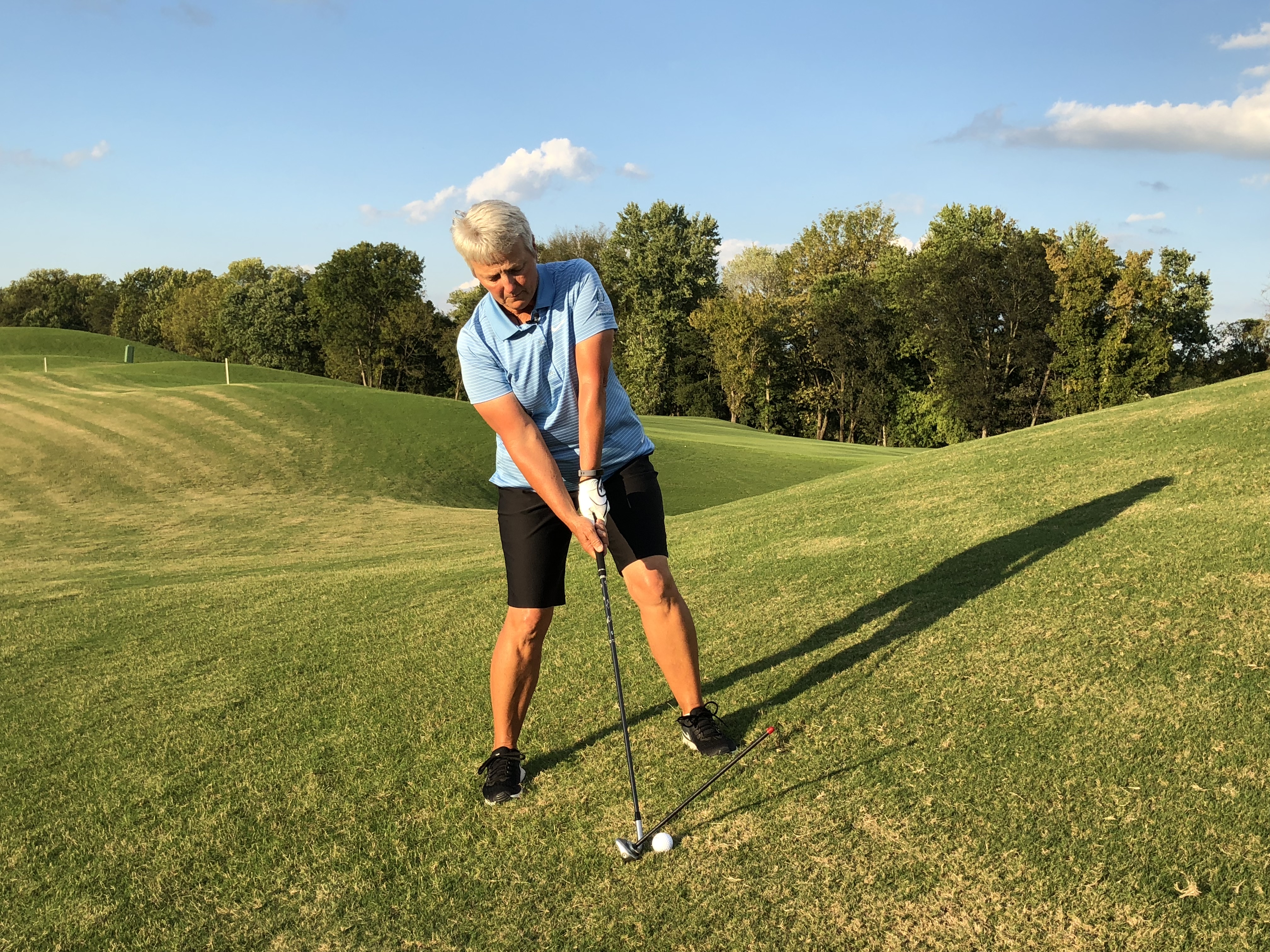 Uneven Lies - What to Expect From an Uphill Lie - Nancy Quarcelino School  of Golf